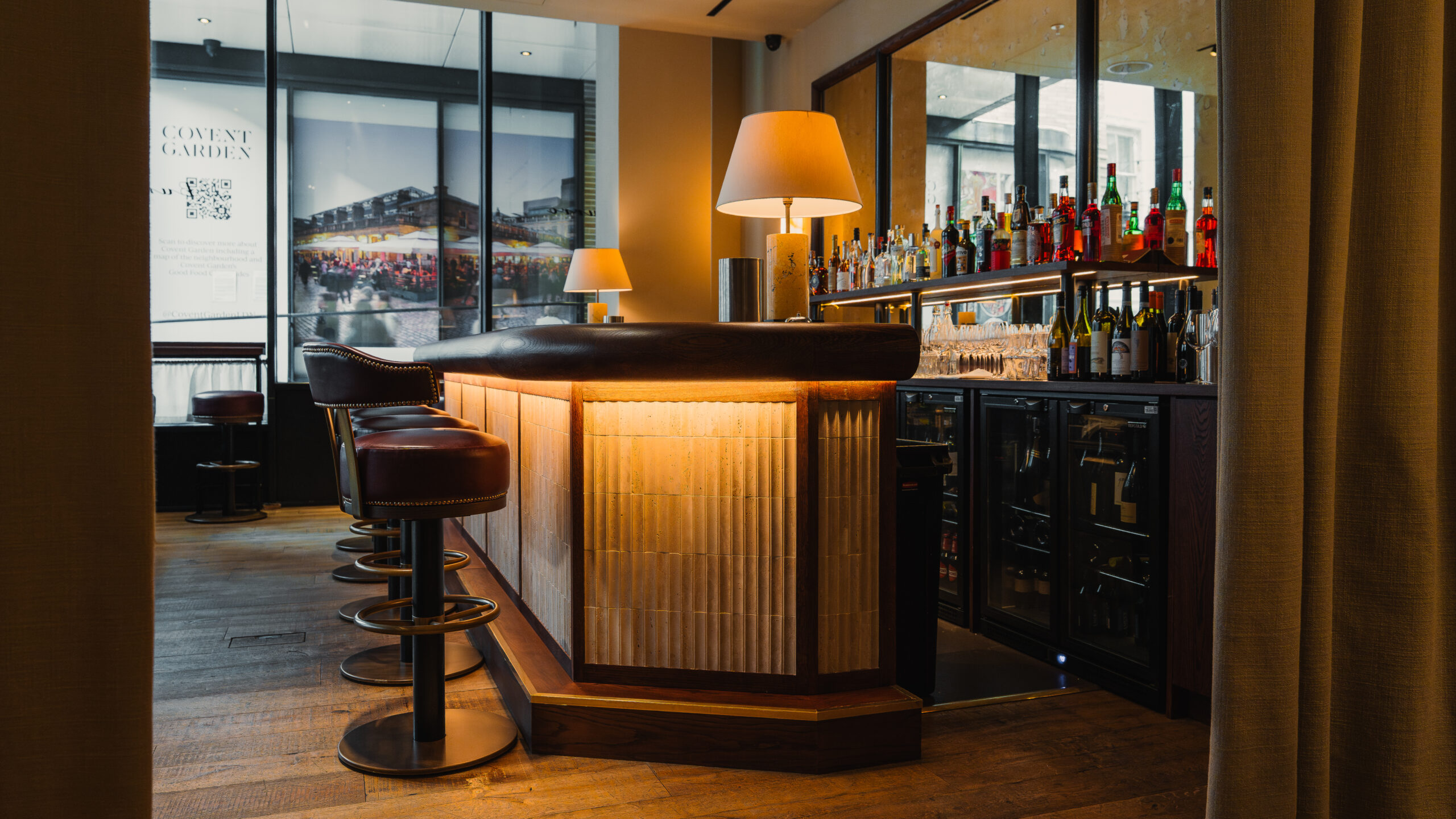 Burro Bespoke Bar. Rosso Levanto marble top. the front panelling has a subtle mosaic tile that adds a bit of texture.